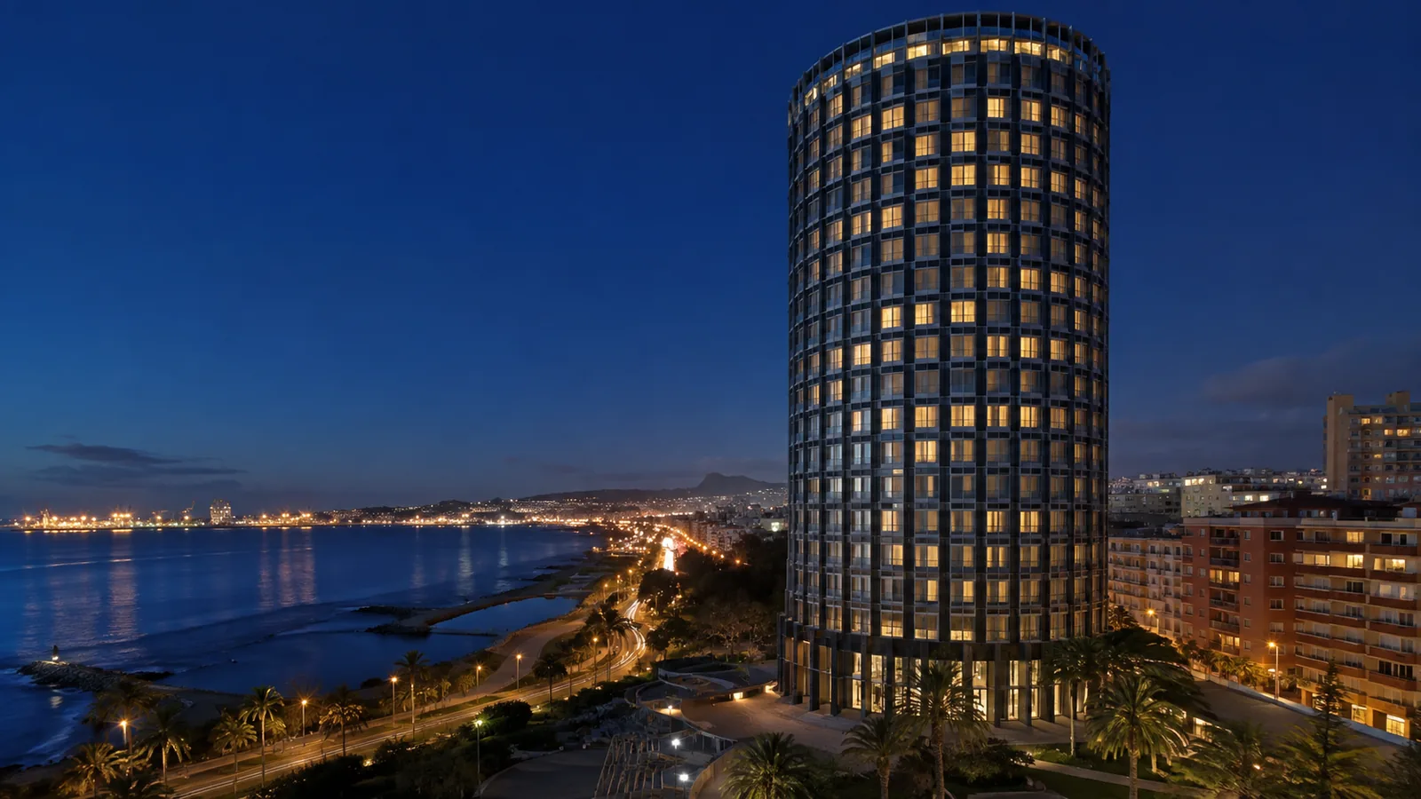 Editorial blue-hour exterior view inspired by AC Hotel Gran Canaria in Las Palmas de Gran Canaria