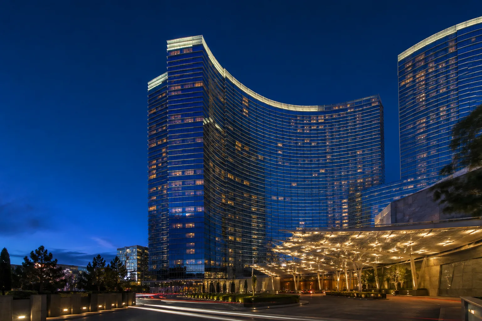 Editorial architectural view of the event-week meeting rhythm at ARIA Resort & Casino
