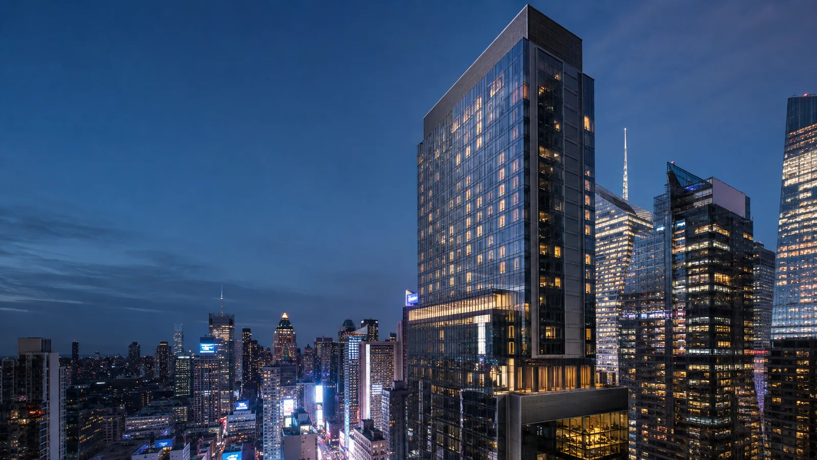 Editorial blue-hour exterior view inspired by Hilton New York Times Square in New York