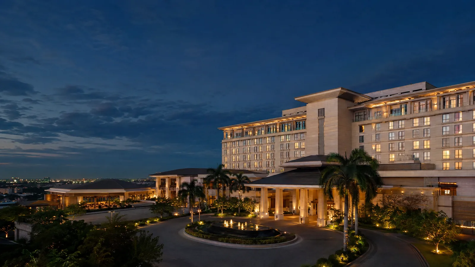 Editorial blue-hour exterior view inspired by Kempinski Hotel Gold Coast City in Accra