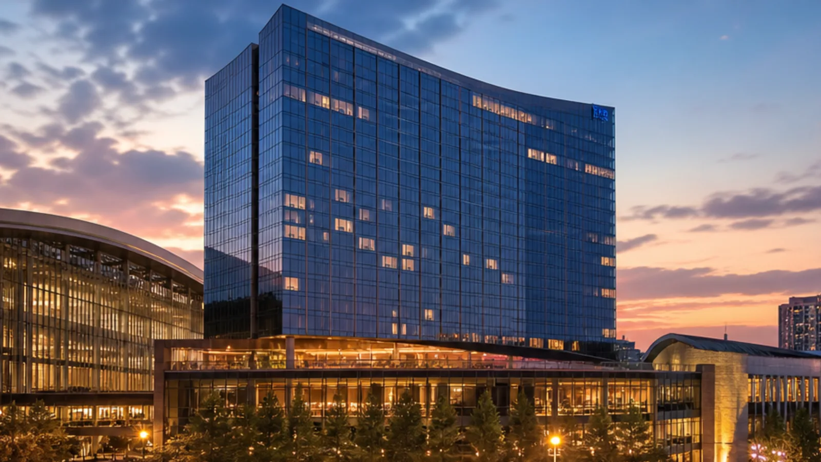 Editorial blue-hour view of Omni Nashville Hotel in Nashville