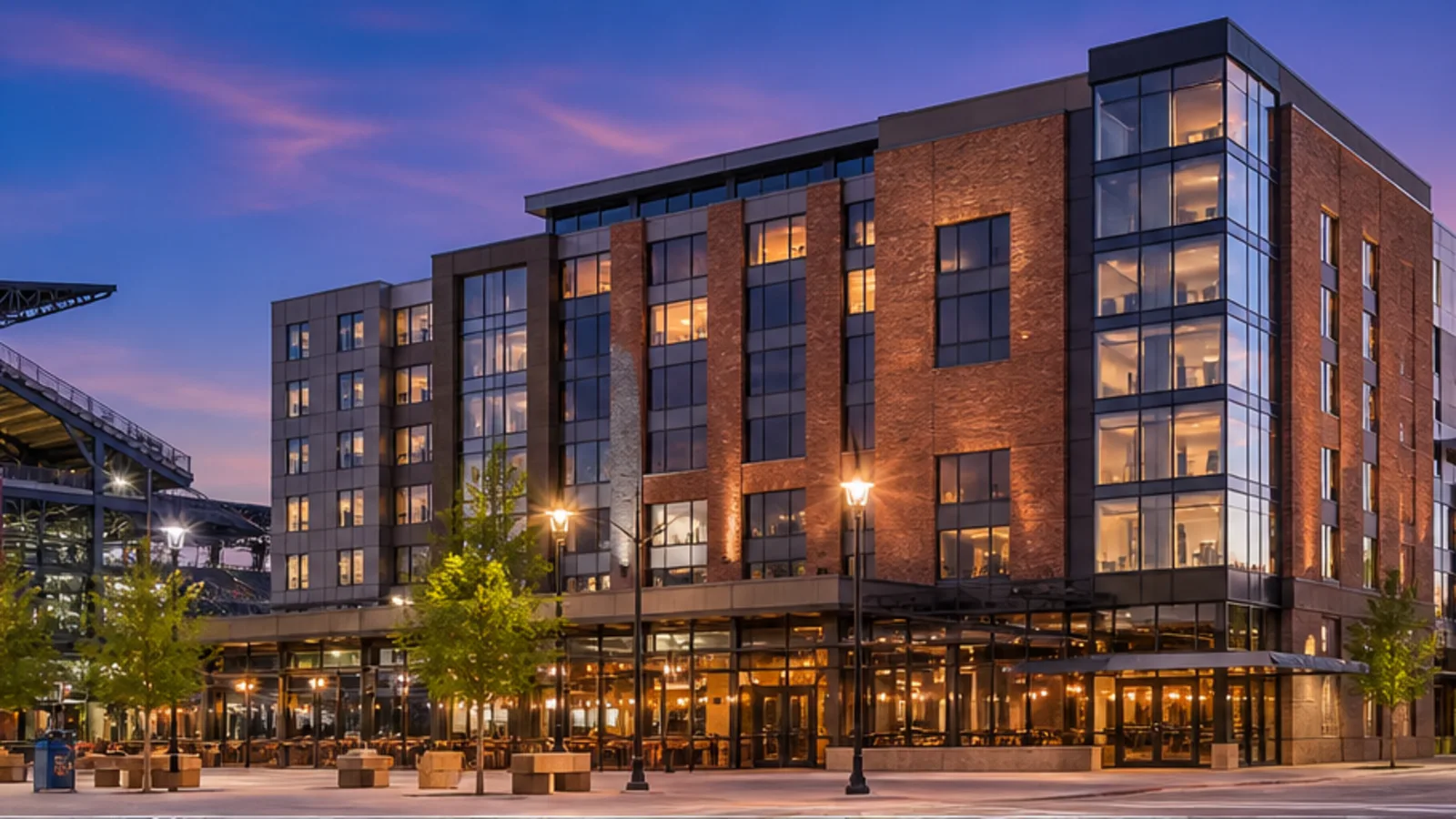 Editorial blue-hour view of The Rally Hotel in Denver