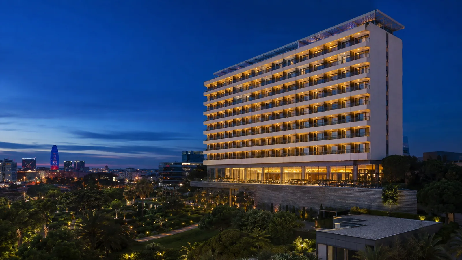 Editorial blue-hour exterior view inspired by Torre Melina Gran Meliá in Barcelona
