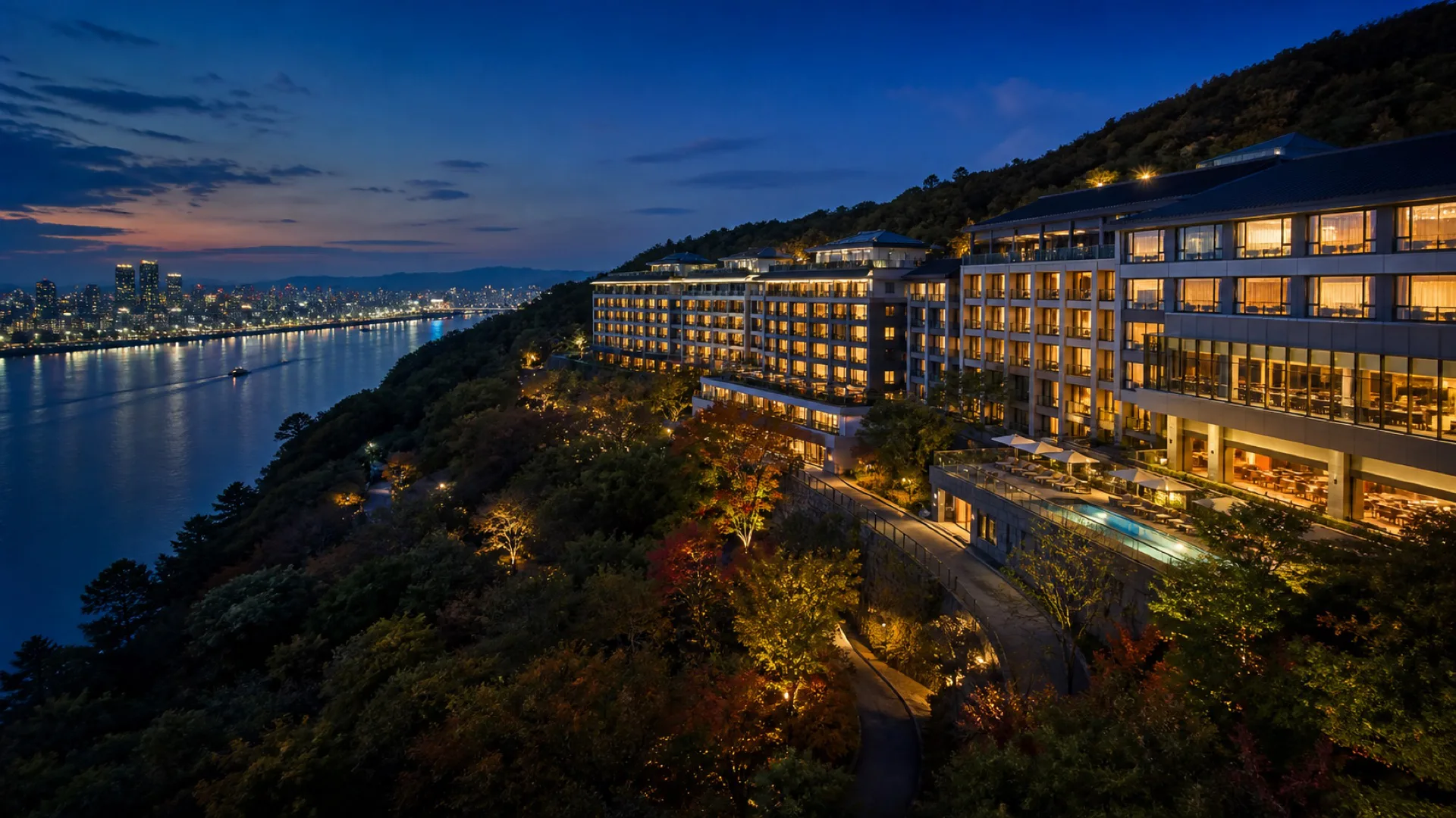 Editorial blue-hour view of a wooded Walkerhill-style hotel campus above the Hangang River in Seoul